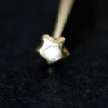 Piercing 18k Gold Star 0750 con una piedra brillante